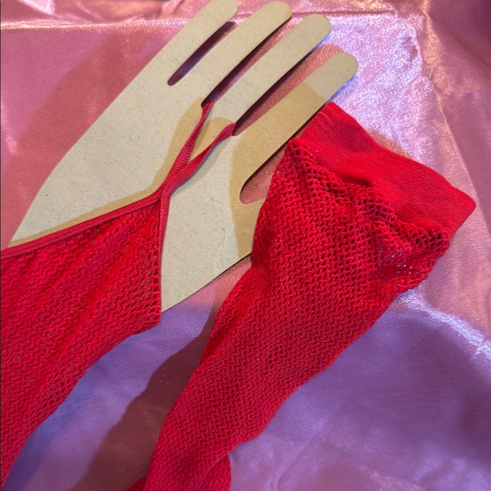 Vibrant Red Fishnet Gloves goes over one finger
BRAND NEW NEVER WORN